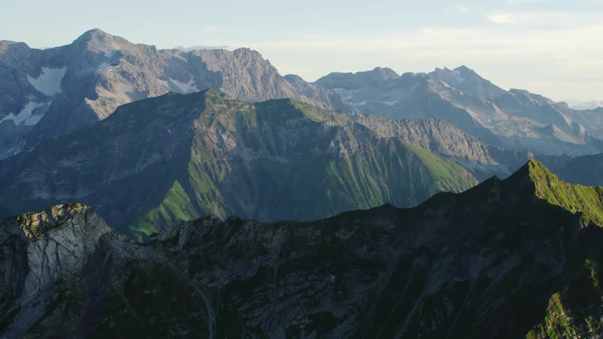 Aerial view of the peaks on a mountain range at morning