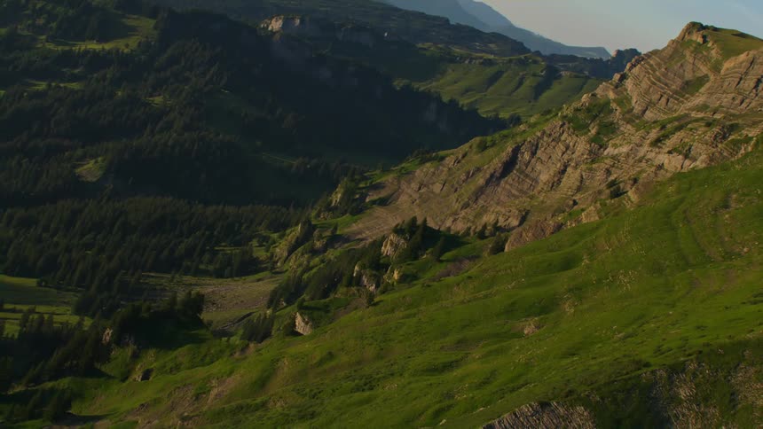 Aerial view of steep green mountain slope
