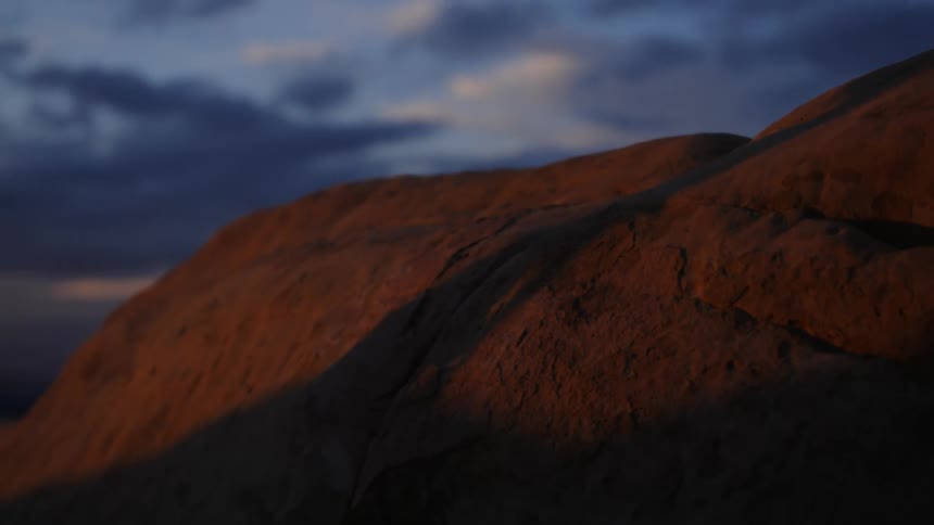 A shadow on a rock formation