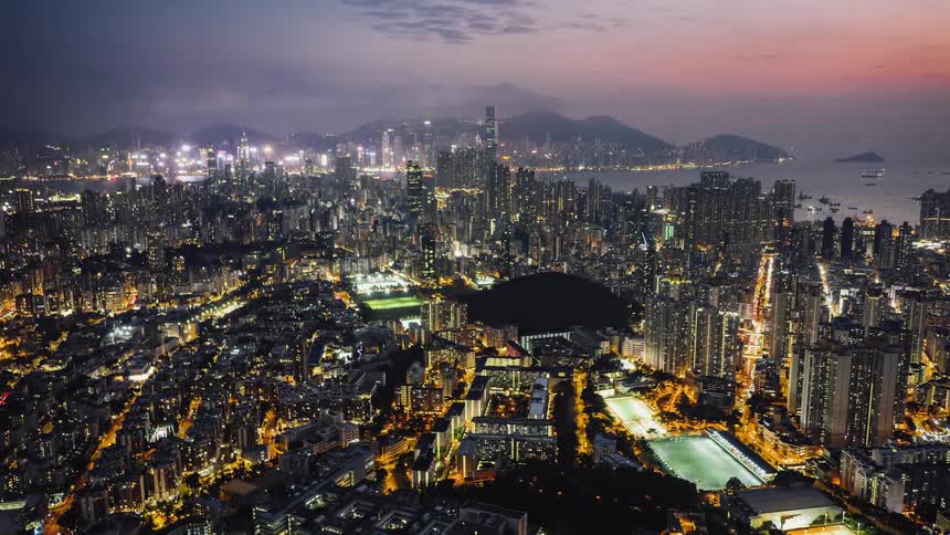 The sun rises and falls over the city