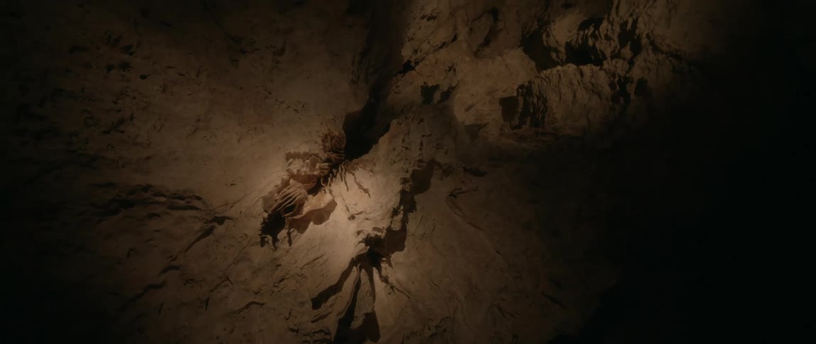 View of cave crevice in dark cave