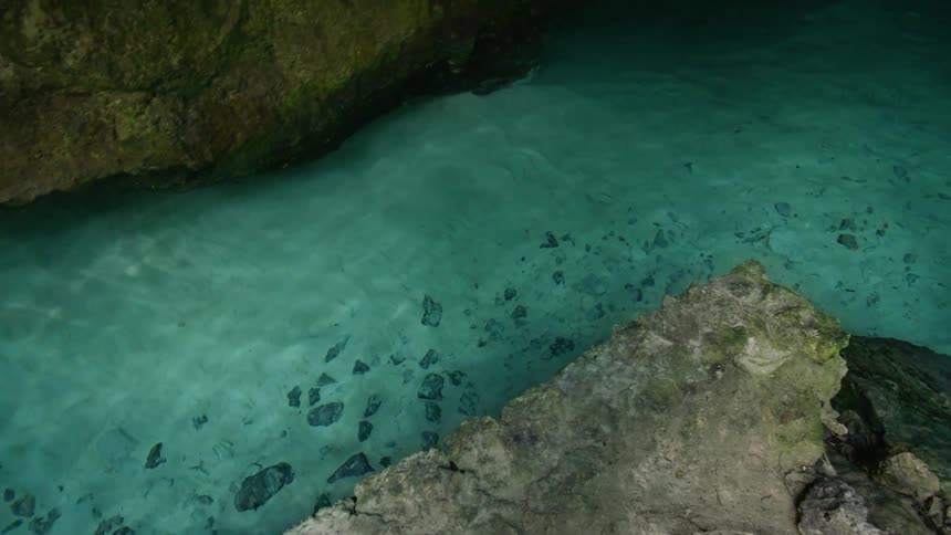 Turquoise water ripples in a lagoon in Tulum, Mexico