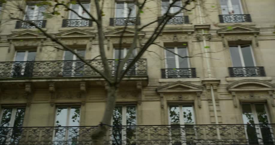 Driving by apartments in a residential arrondissement in Paris