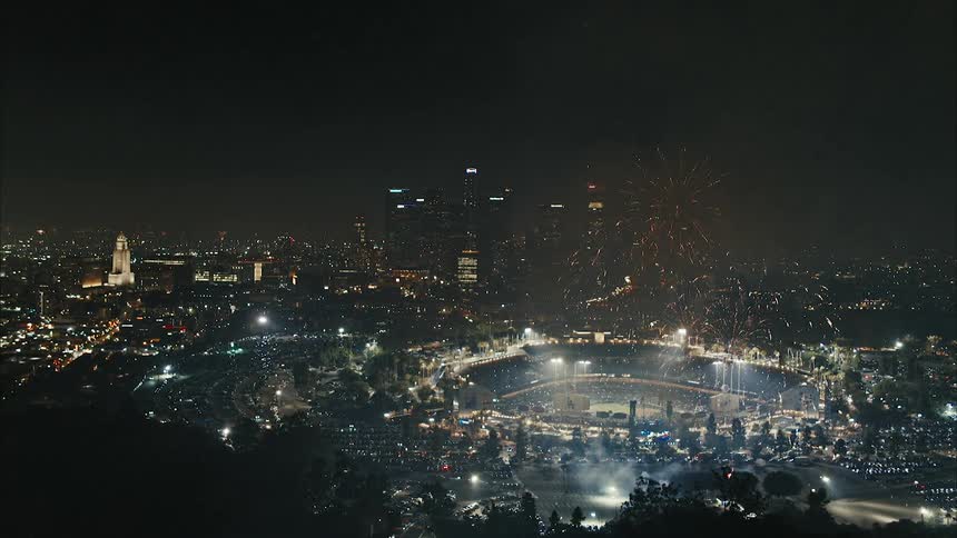 An aerial view of a city with fireworks