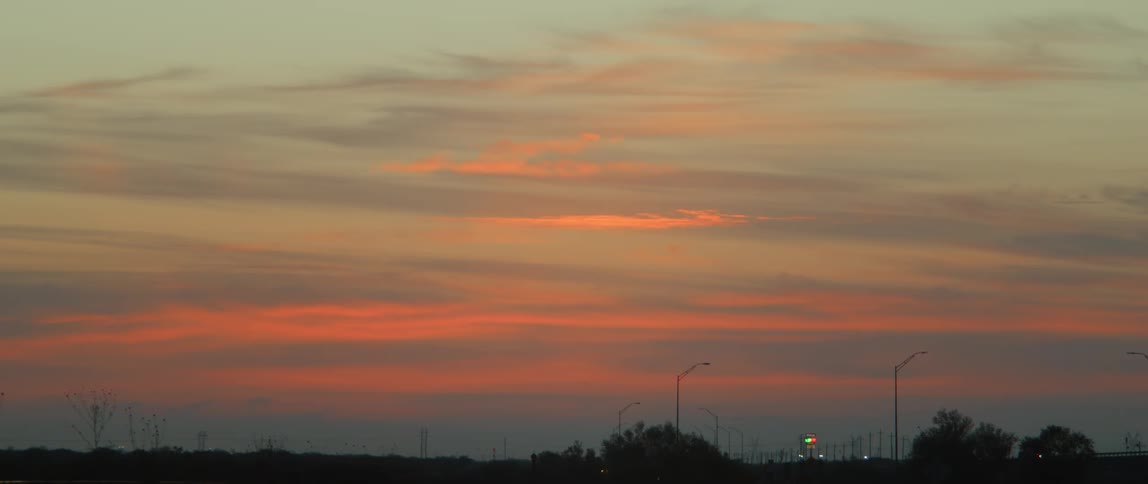 A view of clouds at sunset