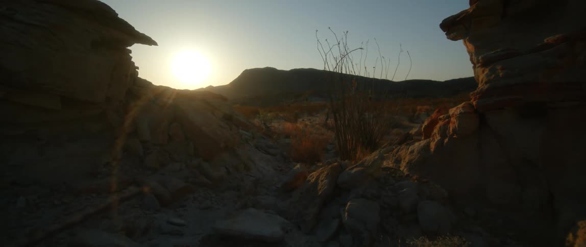 Large rocks fill the valley in a canyon