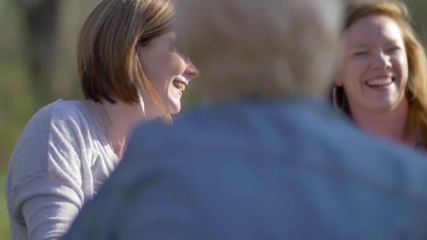 Women laughing in the sunshine