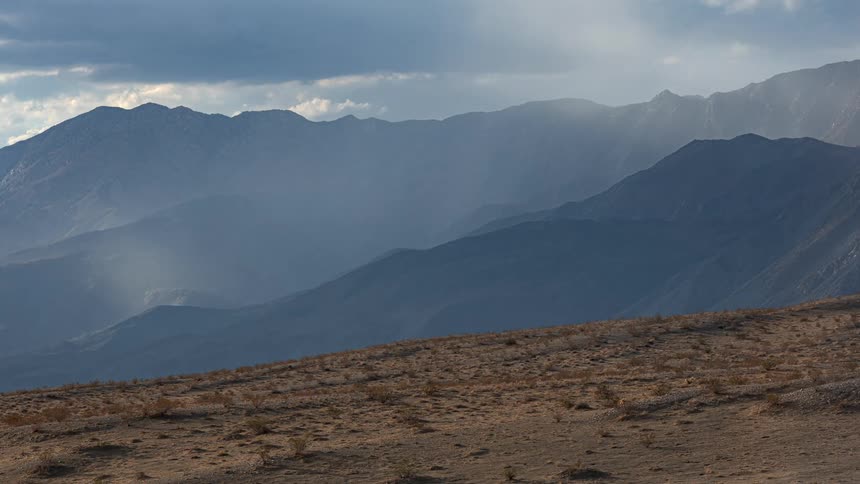 View of mountain slope and mountain ranges