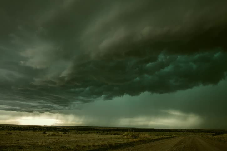 Time lapse of a supercell storm that looks very similar to and ocean wave crashing down and rolling