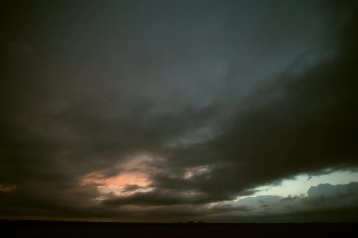 Ethereal dark storm clouds pass in this dreamy and pleasing timelapse