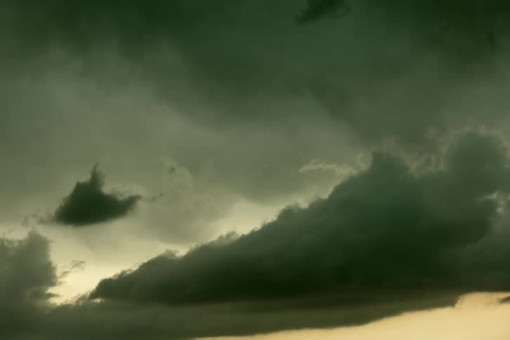Timelapse of thunderstorm clouds building as they move from left to right across the screen