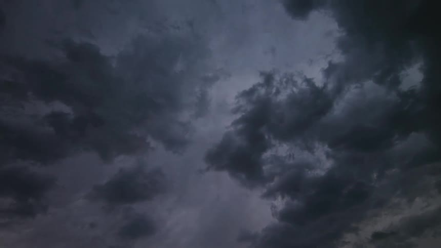 Time Lapse of dark Mammatus clouds rapidly passing over the camera and eventually turn moody and ominous