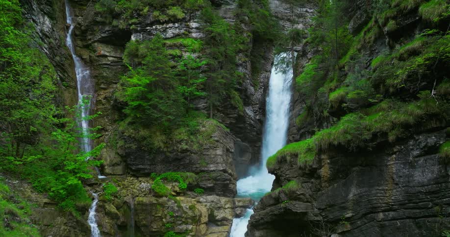 There is a view of a water stream located in the forest area
