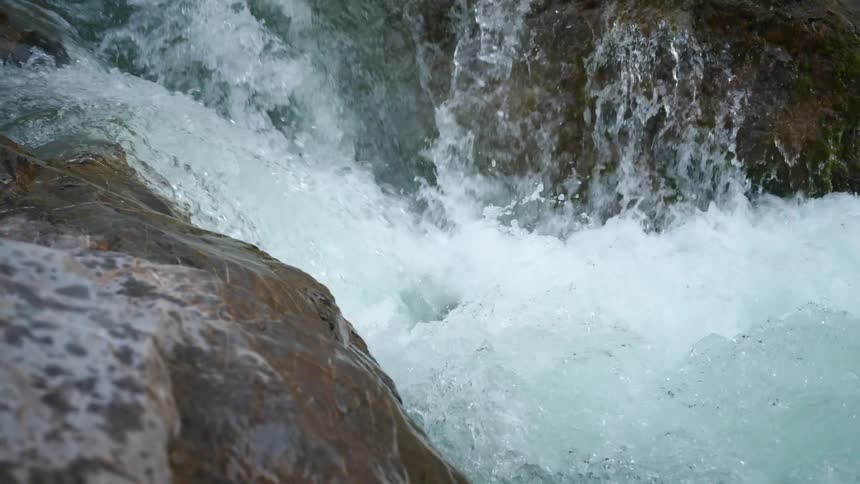 Waterfall cascades downthe mountainside