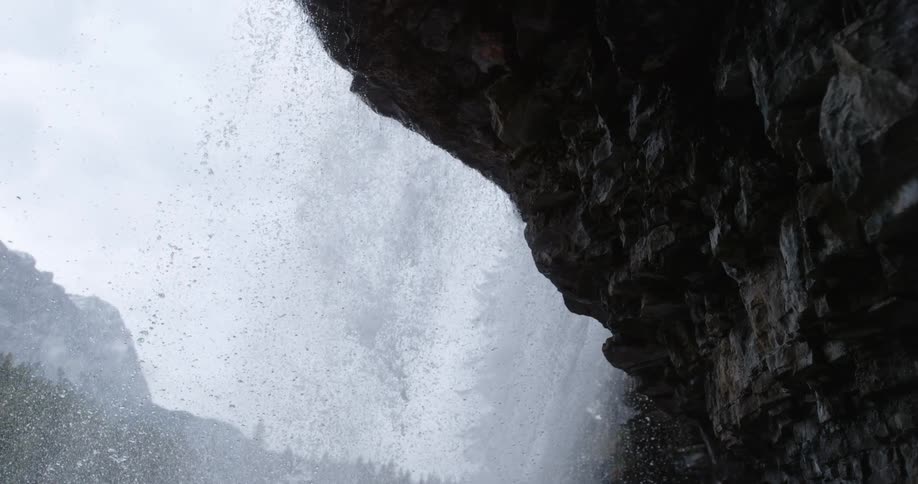 Close up view of a waterfall is displayed