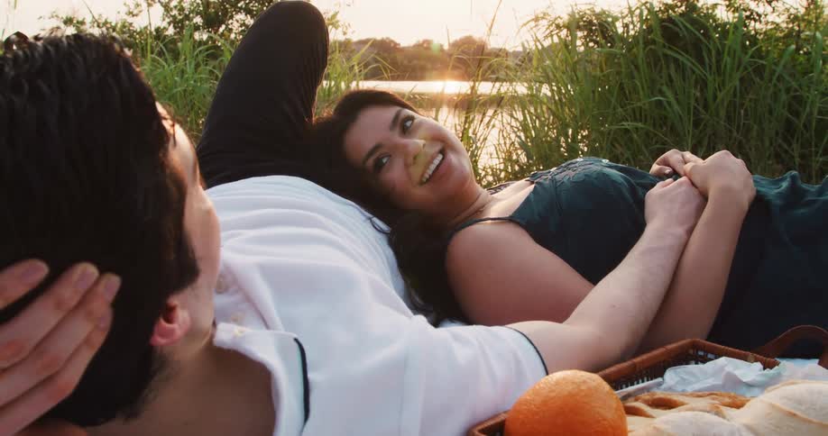 A couple have a picnic together