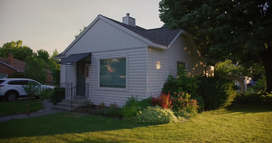 The view is of a small house located in a small town