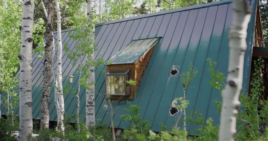 The view is of a cabin in the countryside around day time