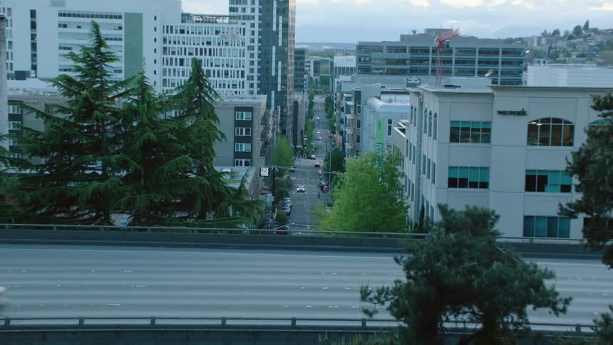 An aerial view of a city with large buildings
