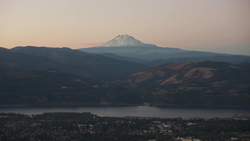 Aerial view of the Columbia river and Mount Adams at dusk as seen from the air
