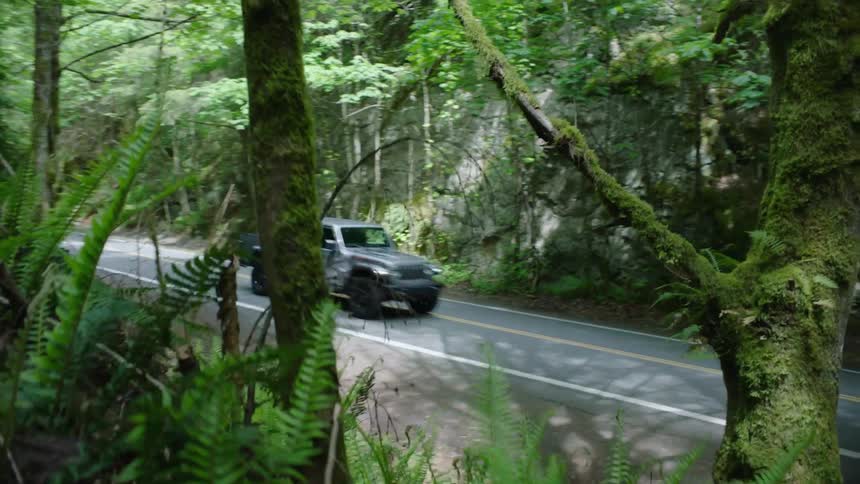 The car drives past on the road