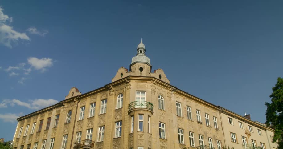 There is a monument building surrounded by some trees