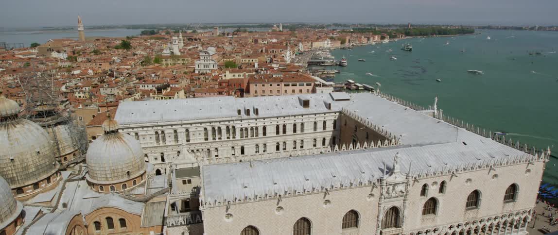 Large buildings in a city on a peninsula during the day