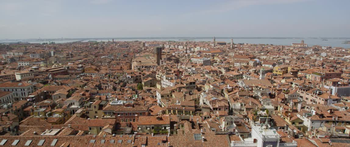 Aerial view of housing in an urban city is displayed