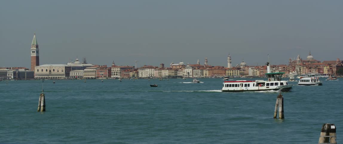 The view is of boats on the water in the middle of the day time