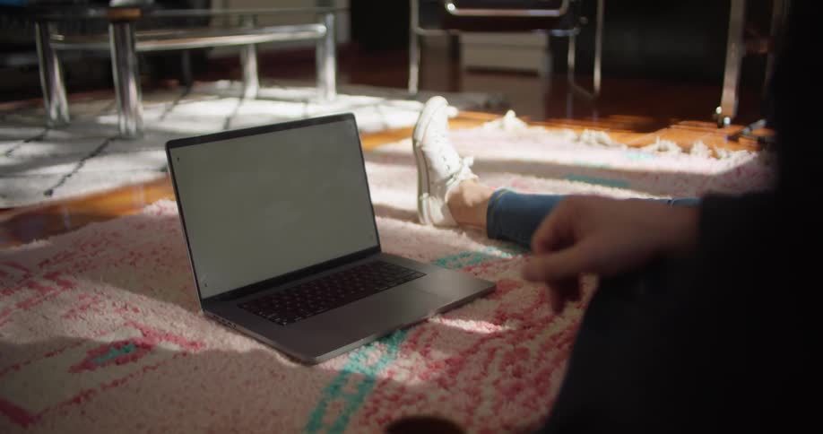 Two friends are sitting on the floor and hanging out with each other