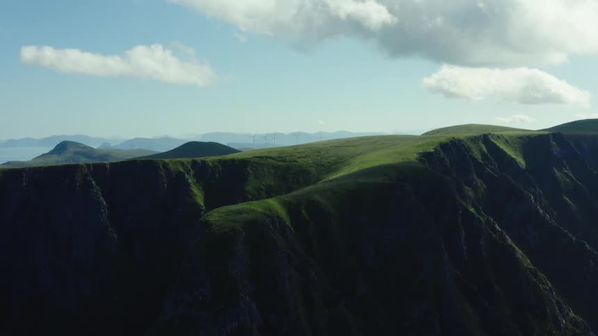 The view is of grass lands in the wilderness