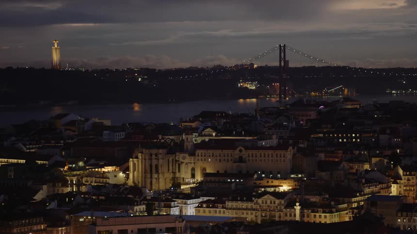 Aerial view of a downtown city during the night time is displayed