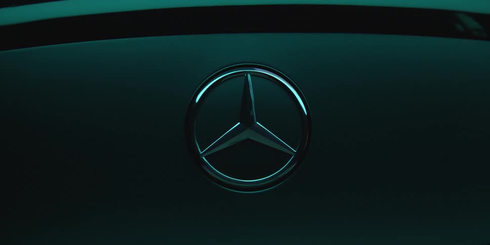 A logo of what looks like an automobile brand is still on a gray background