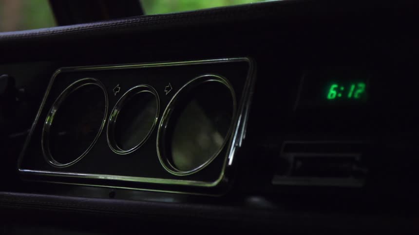 The dashboard of a car someone is driving