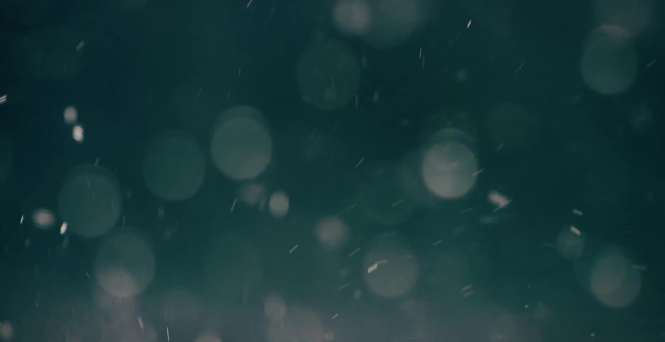Particles swirl through darkness