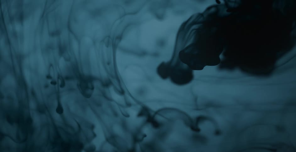 A smoky substance moves as it gets lighter and darker
