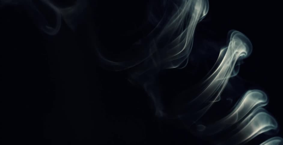 Rings of smoke rise in the air and resemble a spine before disappating