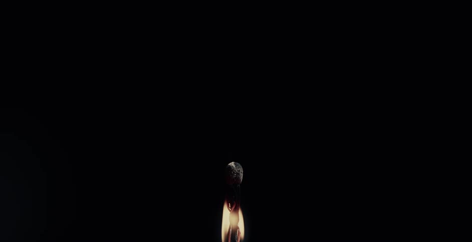 A match lights up with a tall flame and slowly burns itself out