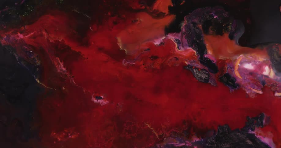 Intense dark liquid ink spreading over a black background