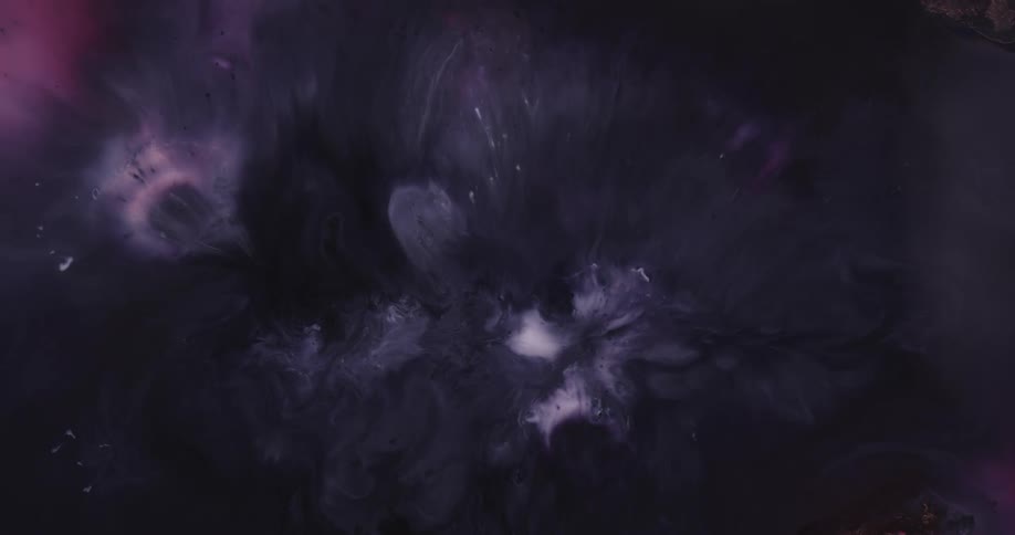 Dark gloomy liquid black and blue ink slowly swirling inwards