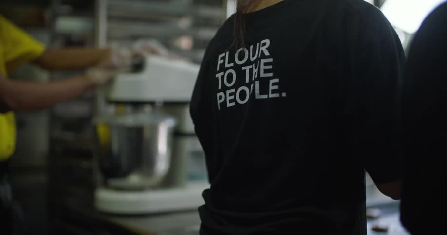 Workers are making food in a bakery