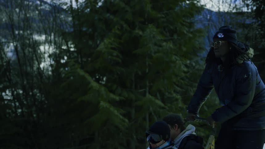 An older women and two kids are outdoors in the winter time