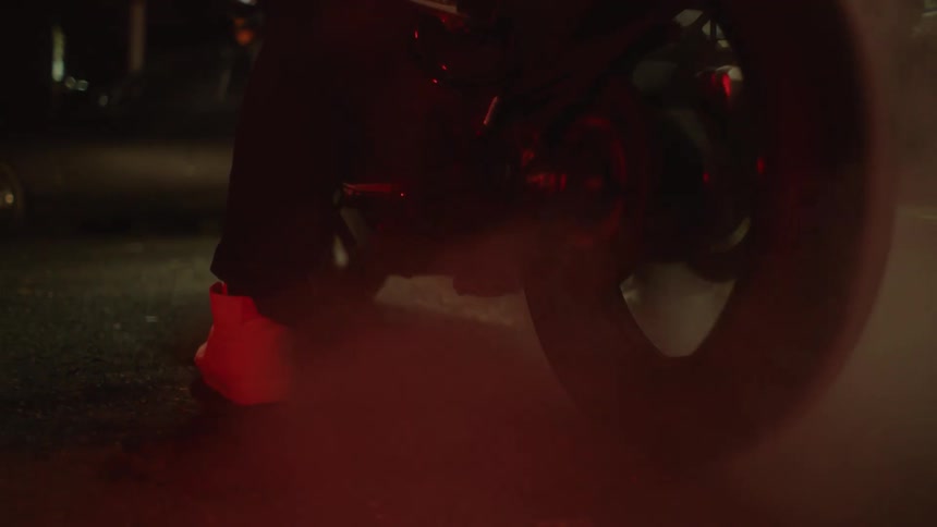 Someone is sitting on there bike indoors and are just chilling