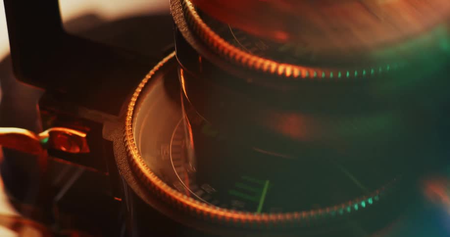 Needles spin around on a stack of compasses