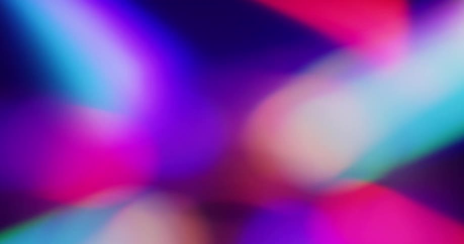 Colorful beams of light brighten and fade