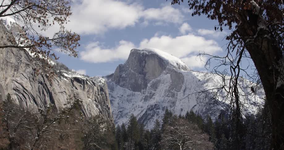 A snowy mountain during the day