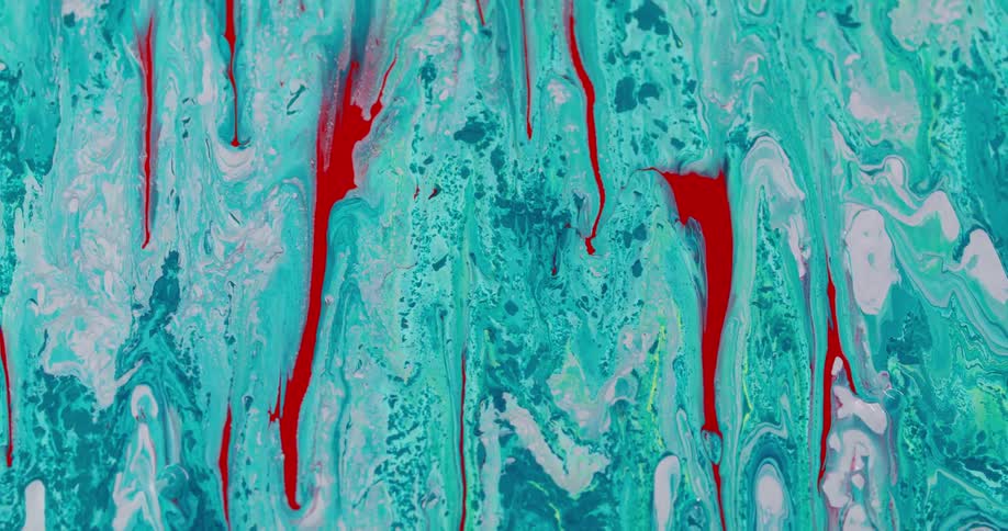Red and white colors move through a turquoise substance without mixing in