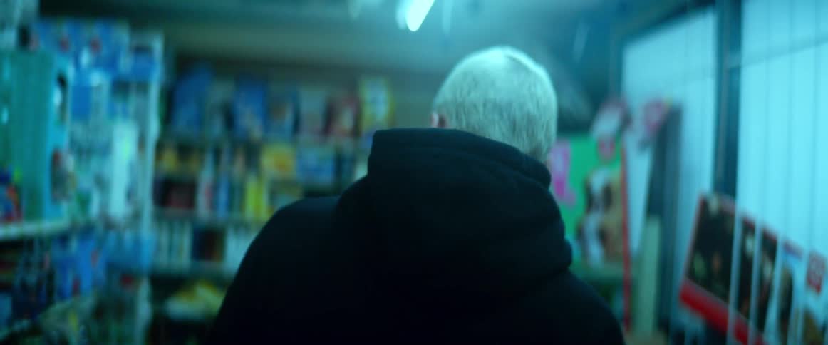 A teenager is shopping in the store