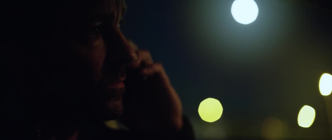 A man is talking on his cell phone