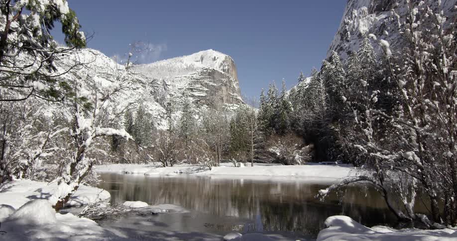 A snowy lake during the day